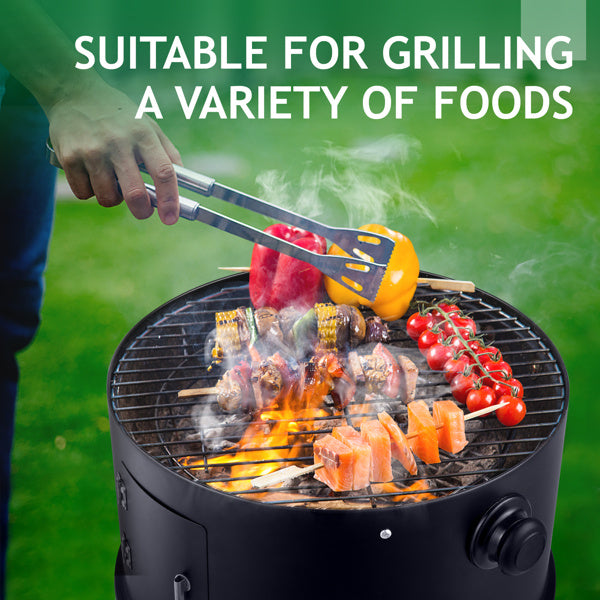 Black smoked charcoal oven grilling skewers with vegetables and meat, ideal for outdoor cooking.