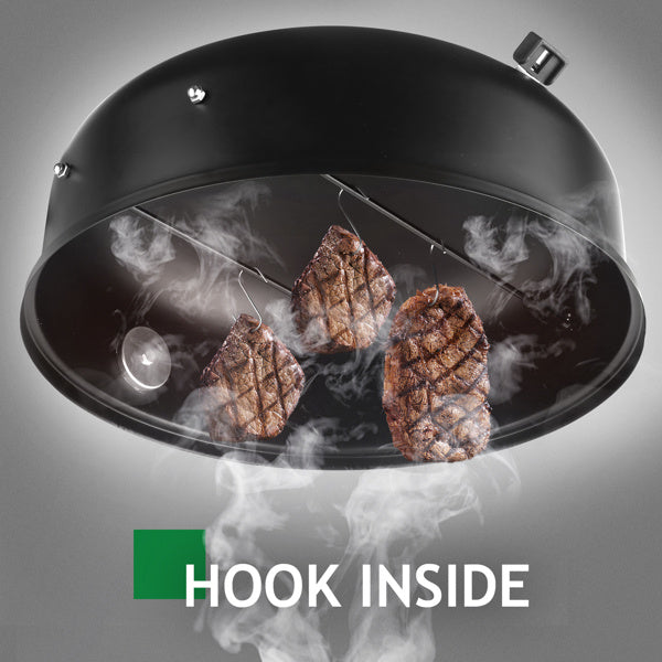 Inside view of the charcoal oven lid with hooks for hanging smoked meats.