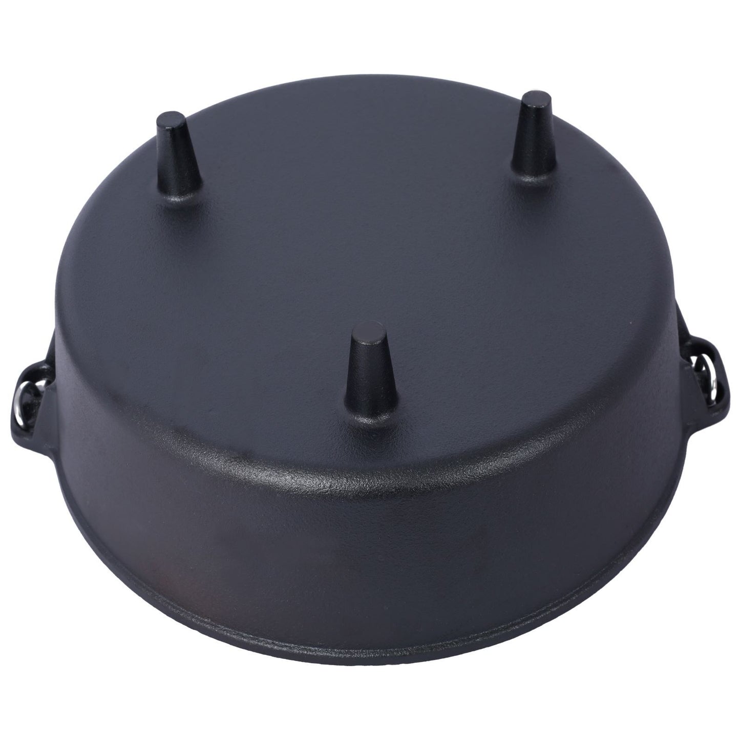 Bottom view of the cast iron Dutch oven with three sturdy legs, designed for stable placement over campfires and outdoor cooking setups.