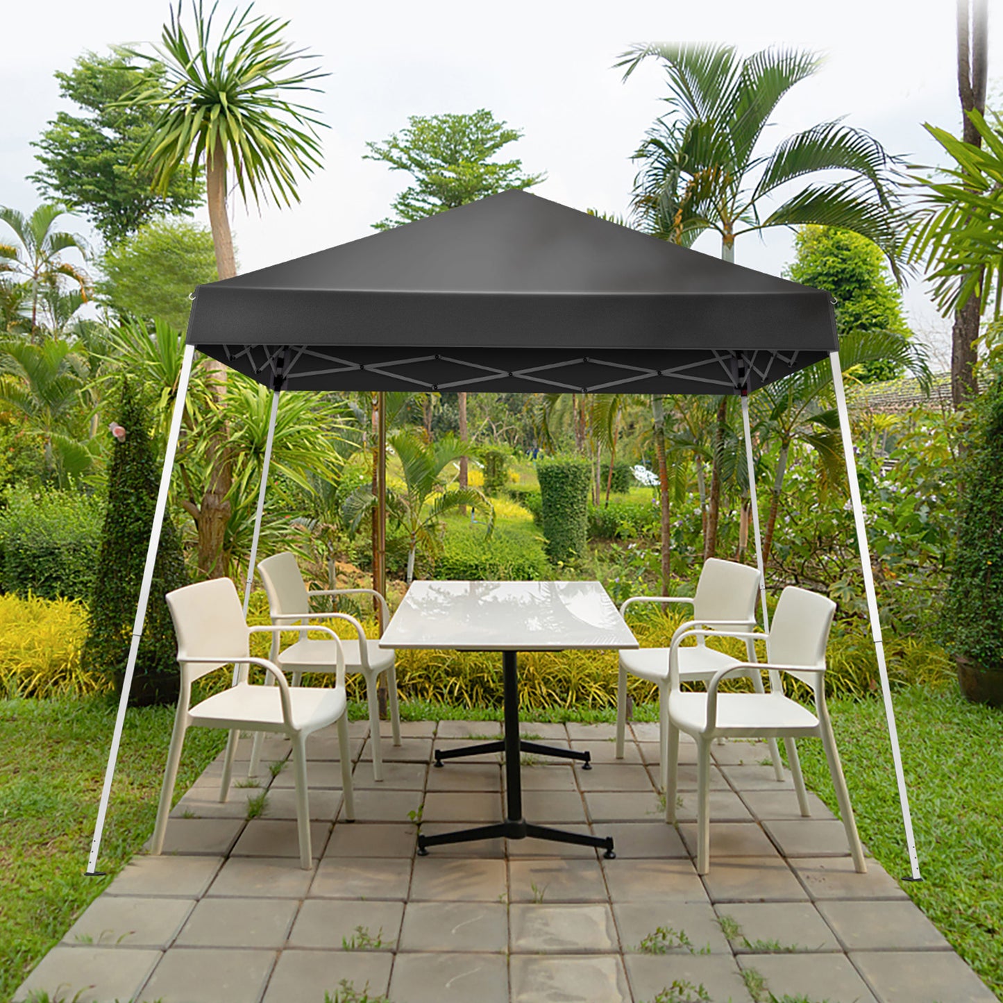 6X6ft dark gray bevel folding gazebo with no enclosure, made of Oxford cloth and sprayed iron pipe, set up in a lush garden with patio furniture.